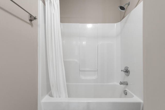 bathroom featuring shower / bath combination with curtain