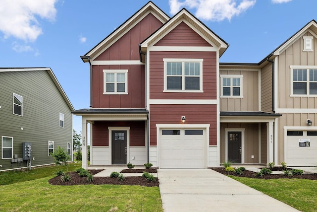 view of front facade with a garage and a front lawn