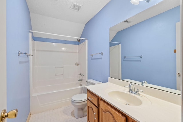 full bathroom with tub / shower combination, a textured ceiling, toilet, and vanity