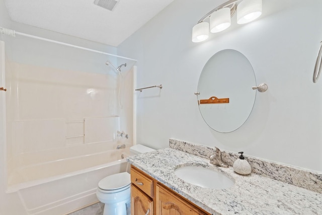 full bathroom featuring vanity, toilet, and bathtub / shower combination