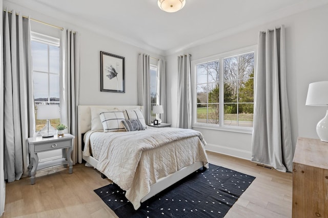 bedroom featuring light hardwood / wood-style flooring