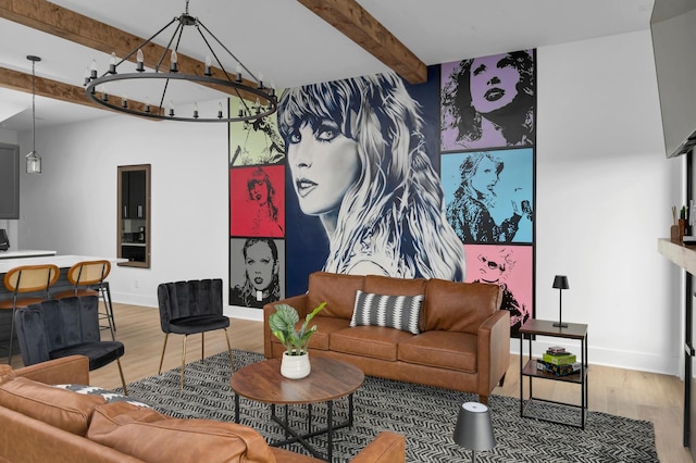 living room featuring beamed ceiling and wood-type flooring