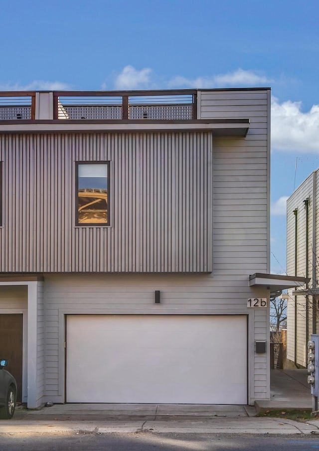 view of property exterior featuring a garage