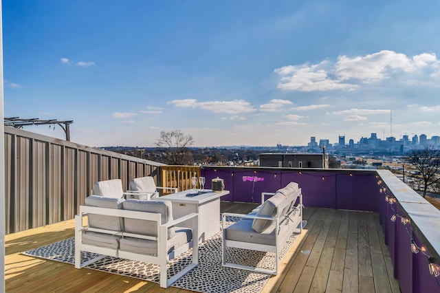 wooden deck featuring outdoor lounge area