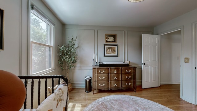 bedroom with light hardwood / wood-style flooring