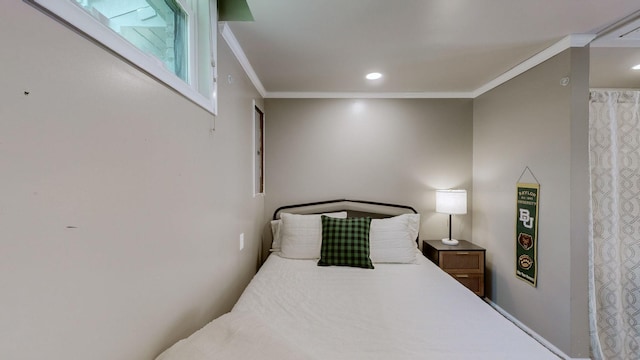 bedroom with crown molding