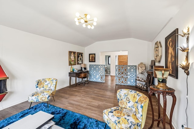 sitting room featuring hardwood / wood-style flooring, an inviting chandelier, and vaulted ceiling