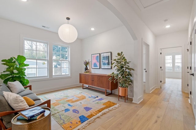 sitting room with light hardwood / wood-style floors