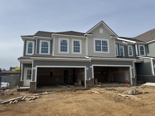 view of front of property with a garage