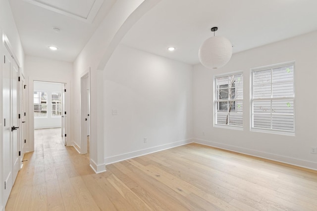 unfurnished room featuring light hardwood / wood-style flooring