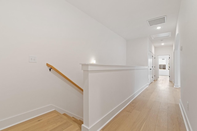 corridor featuring light wood-type flooring