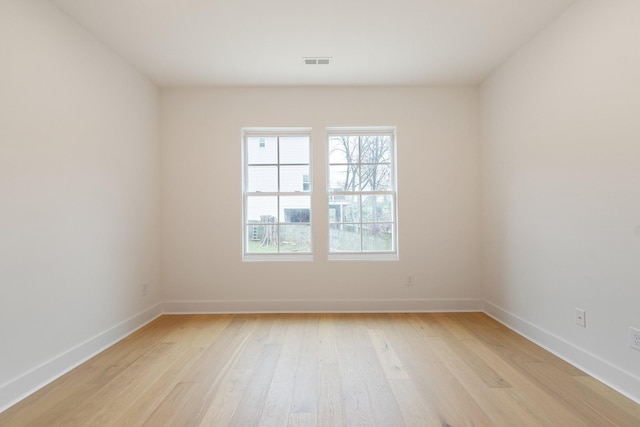 empty room featuring light hardwood / wood-style floors