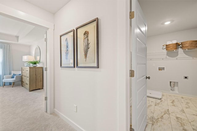 hallway with light colored carpet