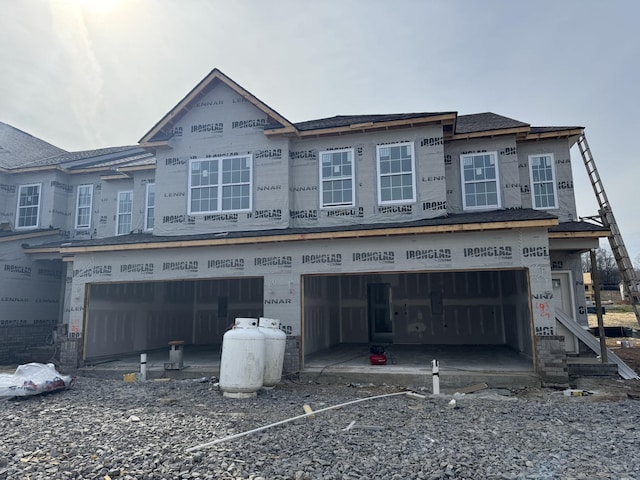 property under construction with a garage