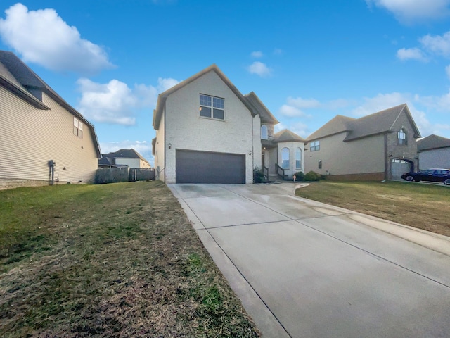 view of front facade with a garage and a front yard