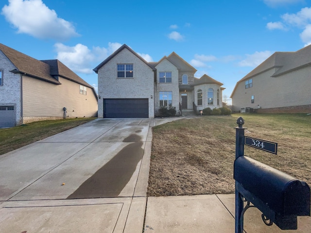 view of front of home featuring a garage, a front lawn, and central air condition unit