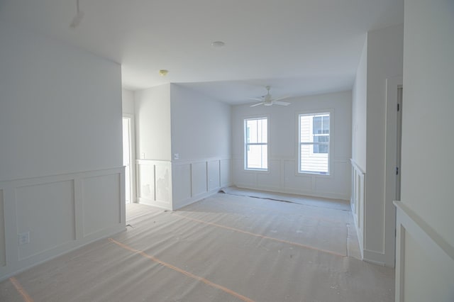 unfurnished room featuring ceiling fan