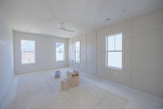 unfurnished room with ceiling fan