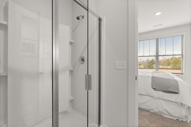 bathroom featuring an enclosed shower