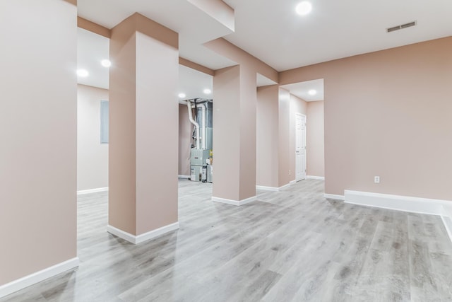 unfurnished room featuring light hardwood / wood-style floors