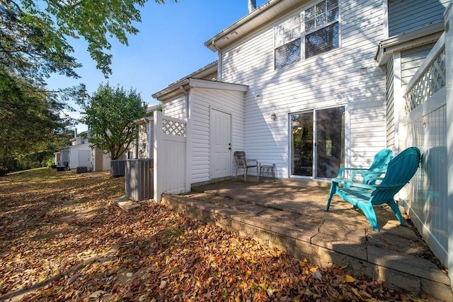 back of house featuring a deck