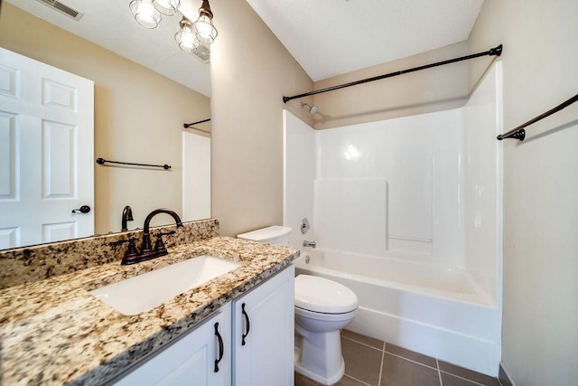 full bathroom featuring vanity, toilet, tile patterned floors, and shower / washtub combination