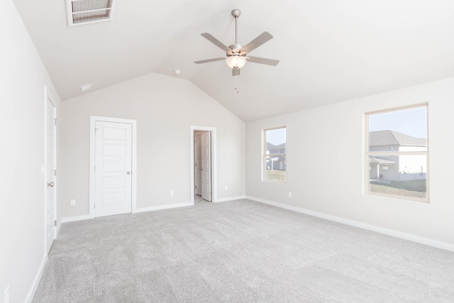 interior space with vaulted ceiling and ceiling fan