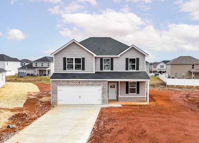 view of front of property featuring a garage