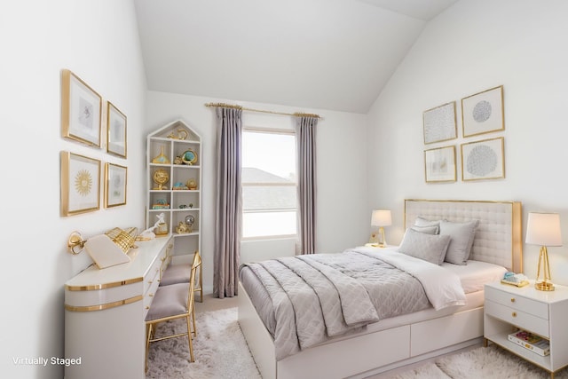 bedroom with light carpet and lofted ceiling