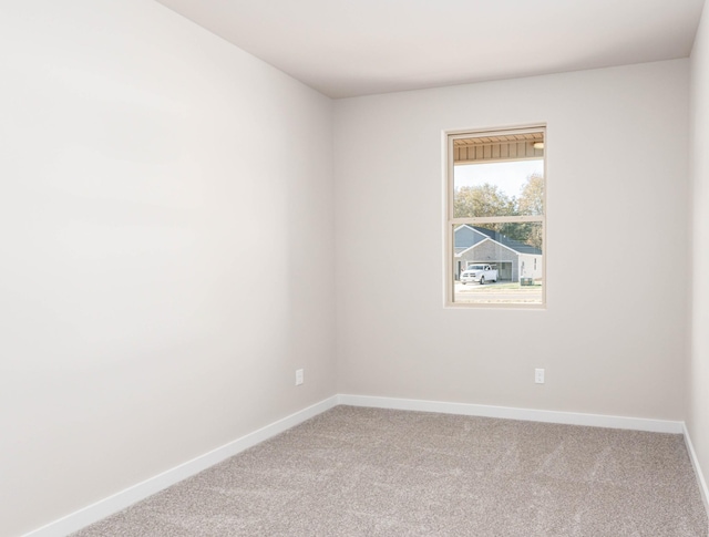 spare room with carpet flooring