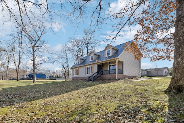 view of property exterior featuring covered porch and a yard