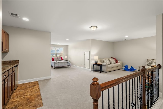 bedroom with light carpet