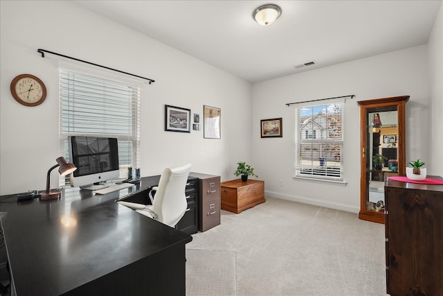 home office with light carpet