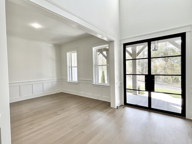 interior space with light hardwood / wood-style floors