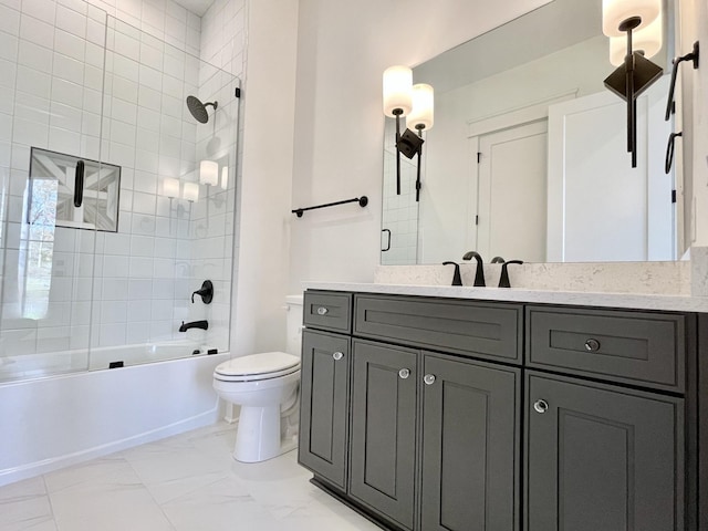 full bathroom featuring vanity, toilet, and tiled shower / bath combo