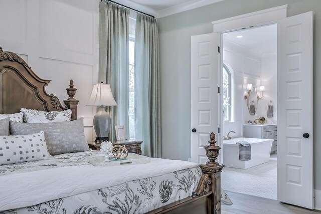 bedroom with ornamental molding