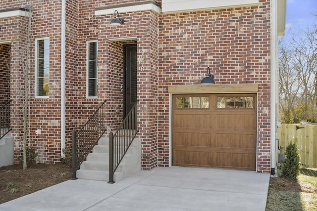 doorway to property featuring a garage