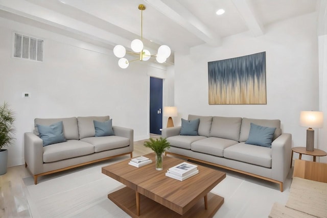 living room featuring beam ceiling, a chandelier, and light hardwood / wood-style floors