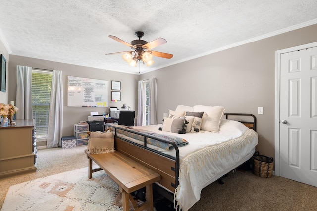 carpeted bedroom with crown molding, a textured ceiling, and ceiling fan