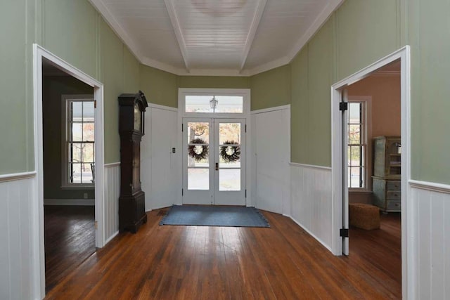 entryway with french doors, beam ceiling, and dark hardwood / wood-style flooring