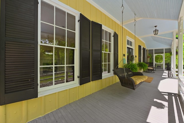 wooden terrace featuring a porch