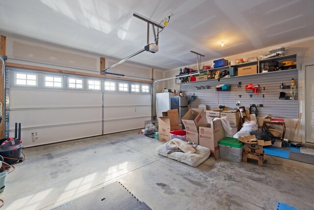 garage featuring a garage door opener