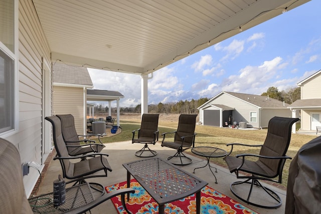 view of patio / terrace featuring a grill and central air condition unit