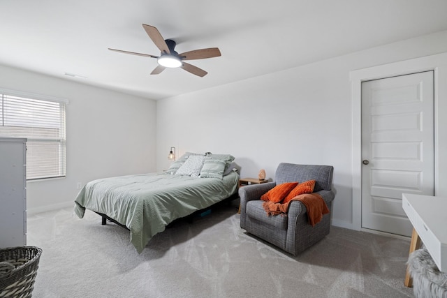 carpeted bedroom featuring ceiling fan