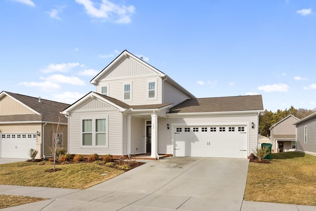 craftsman house featuring a garage and a front lawn