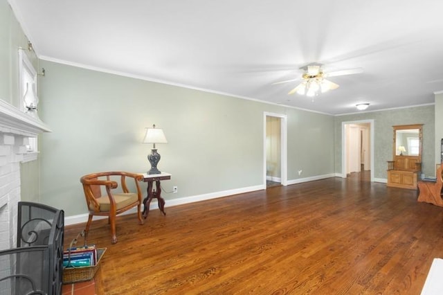 living room featuring a fireplace, crown molding, ceiling fan, and dark hardwood / wood-style flooring