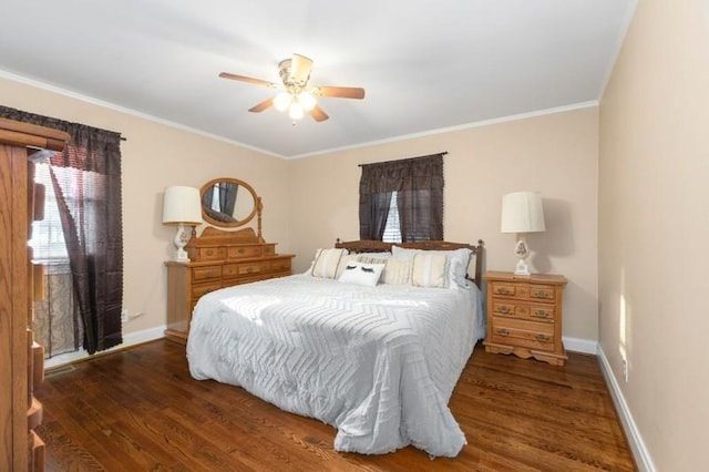 bedroom with ceiling fan, dark hardwood / wood-style floors, and crown molding