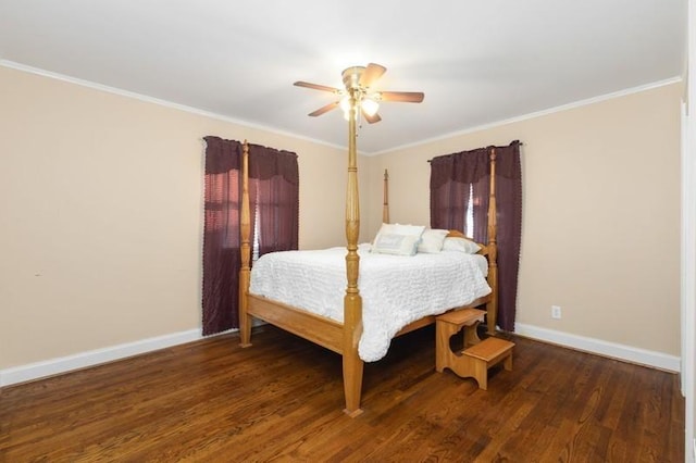 bedroom featuring ceiling fan, dark hardwood / wood-style flooring, and ornamental molding