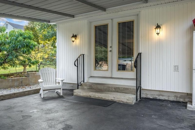 entrance to property with a patio area