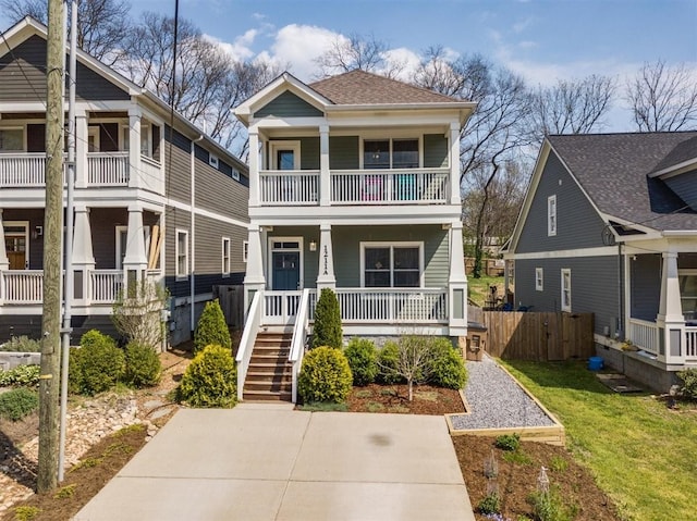 view of front of home with a porch and a balcony